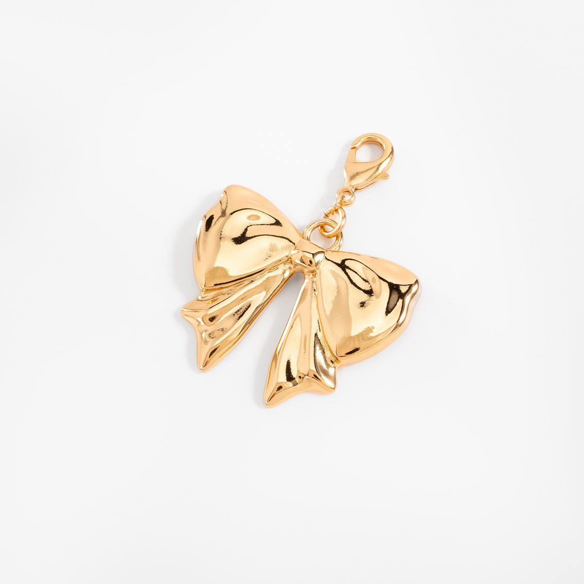 GOLDEN BOW CHARM